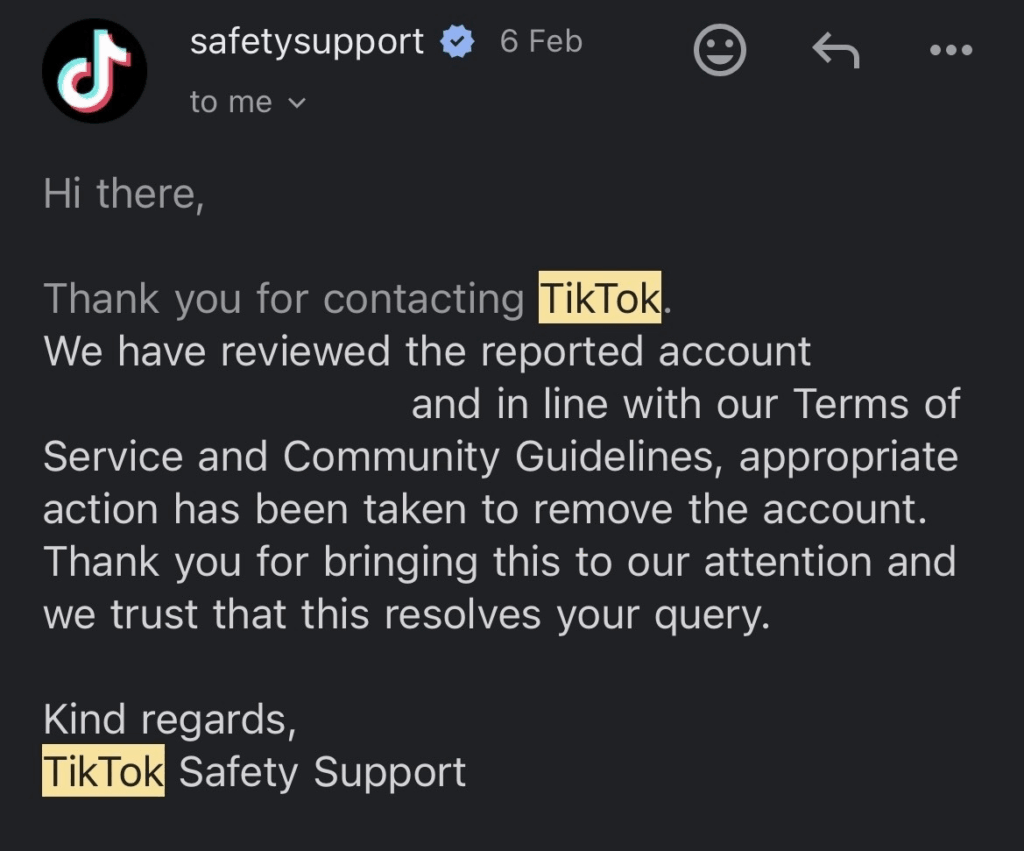 Email confirmation from TikTok Safety Support stating that a reported account was reviewed and removed for violating community guidelines.